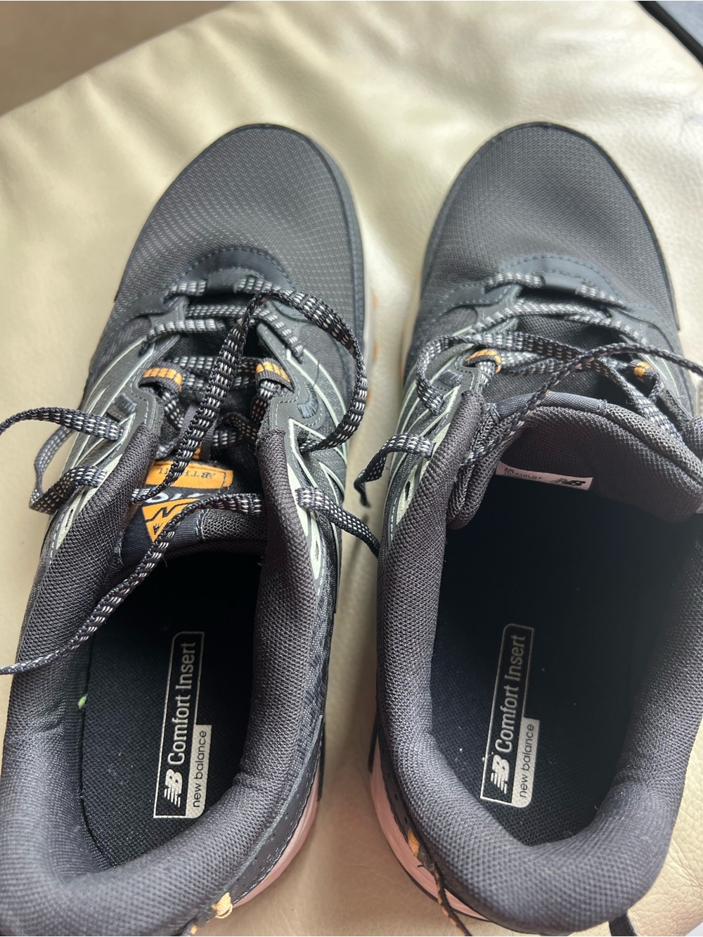New Balance Men’s Black Sneakers with Orange Accents